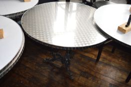 *Two 1m Circular Tables with Stainless Steel Tops on Cast Iron Bases