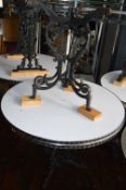 *Two 1m Circular Tables with Stainless Steel Tops on Cast Iron Bases