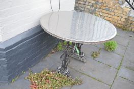 *1m Circular Stainless Steel Topped Table on Cast Iron Base