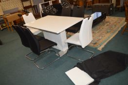 White Dining Table with Four Black and Two White L