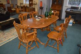 Oval Extending Dining Table with Six Chairs