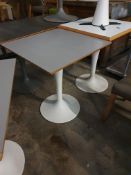 * 4 x tables with modern white bases