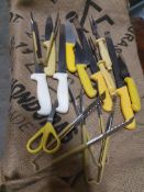 * quantity of yellow and white handled knives/utentils