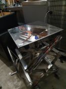 * chrome display table on castors 500w x 500d