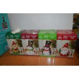 *Four LED Holiday Figurines