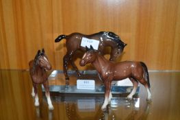 Three Porcelain Horses Including One Royal Doulton