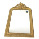 A Victorian gilt wood and gesso overmantel mirror, with rococo floral and foliate decoration,