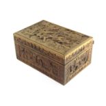 A Chinese carved hardwood camphor wood lady's box, the outer box depicting figures and buildings,