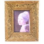 After Vermeer. The Girl With A Pearl Earring, print on canvas, within a ornate floral gilt frame,