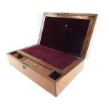 A Victorian mahogany writing slope, with vacant brass plate to the lid, opening to reveal a fitted