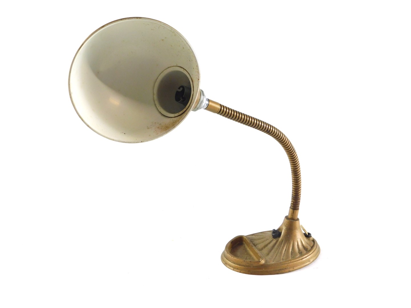 A continental early 20thC metal desk lamp, the domed shade on an angular stem, and a fluted base,