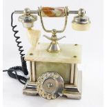 An onyx vintage telephone, with chrome overall finish and dial, 30cm high.