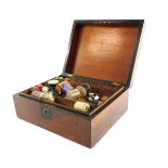 A Victorian walnut and ebony sewing box, with brass escutcheon and rectangular vacant plate to the