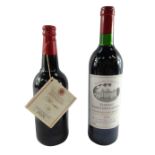 A bottle of Chateau Croix Des Laurets 1995 Saint-Emilion, and a King & Barnes Limited Millennium