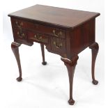 An Edwardian mahogany and satin wood banded lowboy, with one long drawer above one short, flanked by