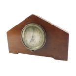 A Smiths of Portland Street London car clock, later mahogany cased, dial bearing no. 35,526, 14cm