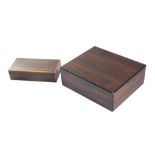 Two rosewood boxes, one a humidor, 9cm high, 27cm wide, 21cm deep, the other a cigarette box, 5cm