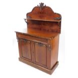 A Victorian mahogany chiffonier, the single shelf back with floral and foliate carving, above a