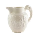 A Wedgwood white glazed jug, relief decorated with a hunting scene, printed marks, 14cm high. (AF)