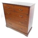 An Edwardian mahogany and satinwood cross banded chest, of two short over three long drawers, raised