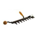 A vintage hedge trimmer, stamped Code Half Time, patent number 16418-49, 54cm long.