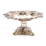 A Victorian silver comport, with hatched and embossed decoration of shells, flowers and rococo