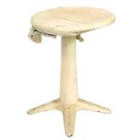 A Singer cream painted cast iron sewing machine stool, with a wooden seat.