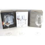 A set of twelve LSA red wine goblets, boxed.