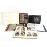 A group of stamp albums, to include Royal Mail Millennium Stamp Album, World, GB and other stamps,