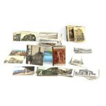 A group of various postcards, to include black and white city scapes from the 20's and 30's, trains,