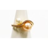 Withdrawn presale by vendor- An Atlo 18ct rose gold pearl dress ring, the twist design band set with