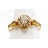 A 9ct gold and cubic zirconia set Victorian memorial style dress ring, the central cluster with