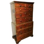 A 19thC oak and feather banded chest on chest, the top with a moulded cornice above two short and