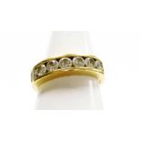 Withdrawn presale by vendor- An 18ct gold diamond half hoop dress ring, set with seven tension set