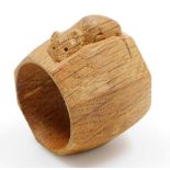 A Mouseman light oak napkin ring by Robert Thompson of Kilburn, 5cm high.