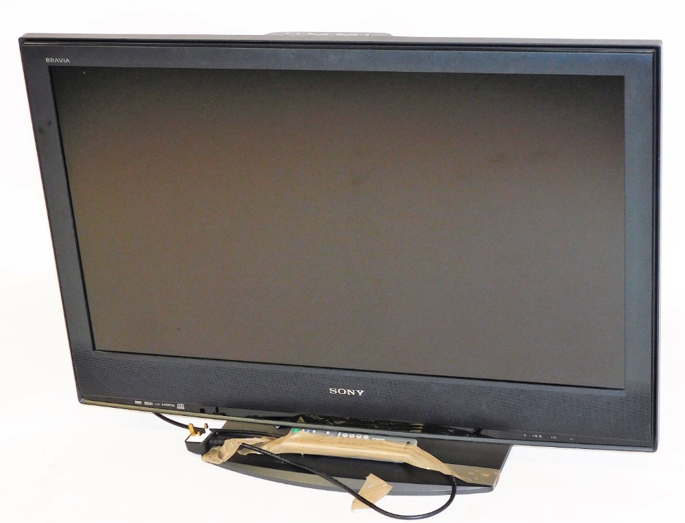 A Sony Bravia 40'' flat screen television, model number KDL-40S2530, with leads and remote.