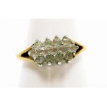 A cluster ring, set with layered cz stones, on yellow metal band, unmarked, ring size P½, 2.8g all