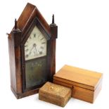 An American walnut cased mantel clock, arched case and painted dial, small Indian carved box, and