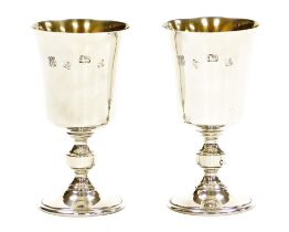 A pair of Elizabeth II silver goblets, with a plain bowl and knopped stem, Birmingham 1975, by