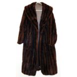 A vintage mink full length fur coat, silk lined. On initial inspection some small 'pulls' to lining,