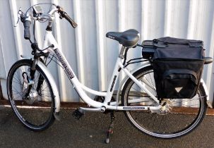 An A Powered Bicycle Free Spirit low step electric bicycle, with keys and cover.