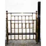 A Victorian brass bed head and foot, with orb finials and turned rails, 141cm wide.