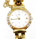 A Urech 18ct gold lady's wristwatch, the mother of pearl dial with Roman numerals, and outer set