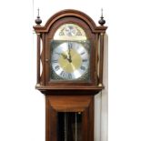 A longcase clock, the brass dial with silvered chapter ring bearing Roman numerals, stamped Tempus