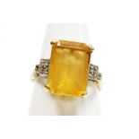 Withdrawn presale by vendor- A 9ct gold citrine and cubic zirconia set dress ring, the large