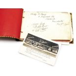 An autograph book bearing various signatures of Manchester United FA cup winners, to include Jack