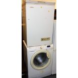 A Hoover Vision HD 8kg washing machine, VHD842, and a Eurocold freezer.