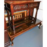 An oak Old Charm side table, with two frieze drawers, 76cm high, 107cm wide, 43cm deep, and a coffee