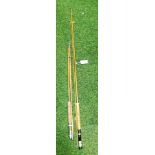 Two split cane fly fishing rods.