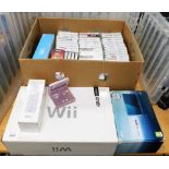 A Nintendo Wii, boxed, a Wii remote, a Nintendo GameBoy Advanced SP, a Nintendo 3DS, various